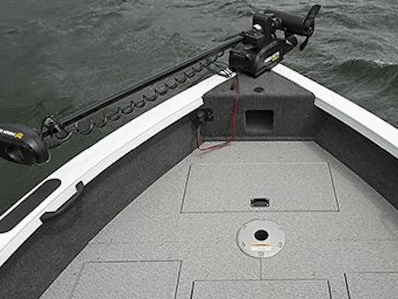 Slide: The Image of 2025 Crestliner 1850 Super Hawk JS boat deck with trolling motor on water. - 49