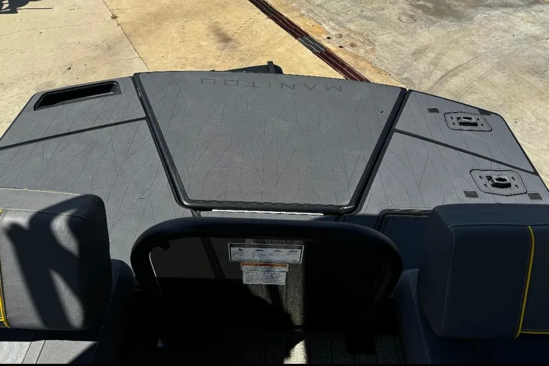 Slide: The Image of 2024 Manitou Explore boat deck with sleek design and modern features. - 7
