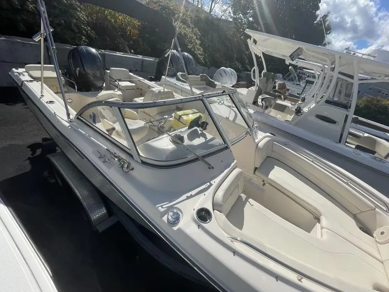 Slide: The Image of 2017 Grady-White 205 Freedom boat with sleek design and spacious seating. - 7