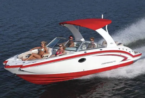Slide: The Image of 2012 Chaparral 264 Sunesta speedboat cruising on water with passengers. - 12