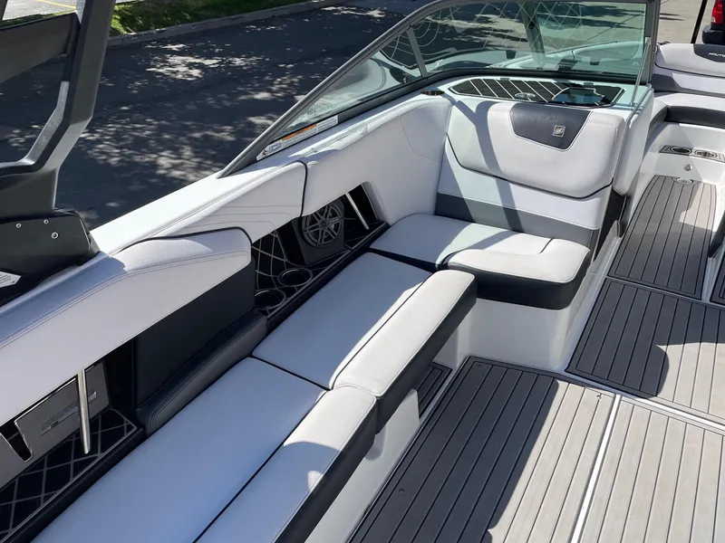 Slide: The Image of 2019 Nautique Super Air Nautique GS24 interior with sleek seating and modern design. - 10
