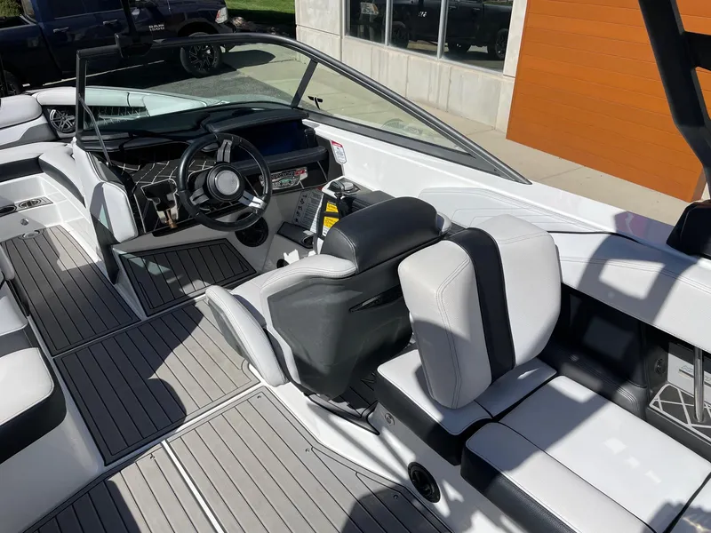 Slide: The Image of 2019 Nautique Super Air Nautique GS24 interior with sleek design and modern controls. - 6