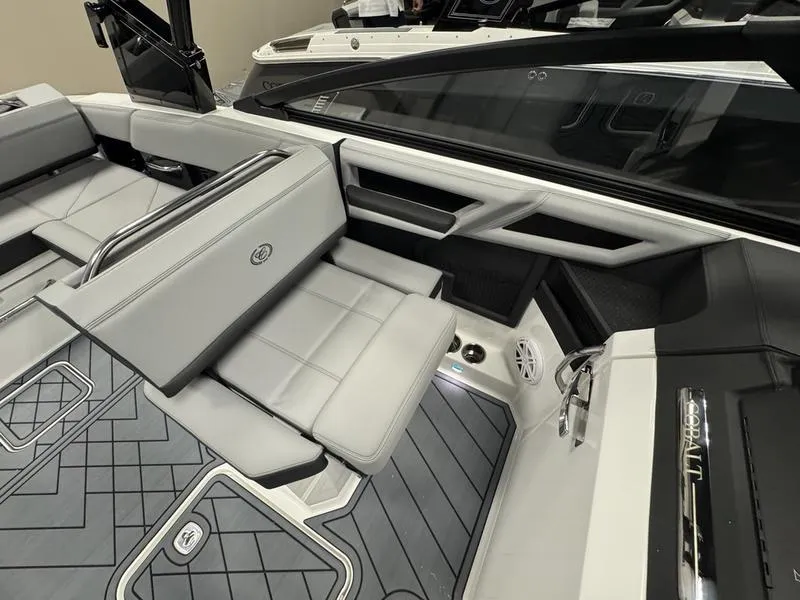 Slide: The Image of 2025 Cobalt R6 boat interior with sleek gray seating and modern design. - 10
