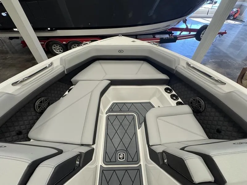 Slide: The Image of 2025 Cobalt R6 boat interior with sleek seating and modern design. - 14