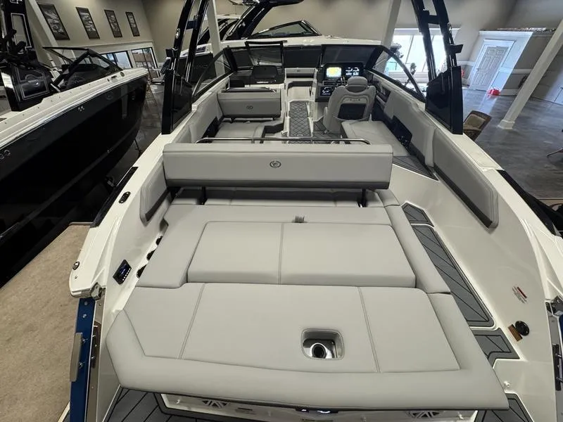 Slide: The Image of 2025 Cobalt R6 boat interior with luxurious seating and modern dashboard. - 17