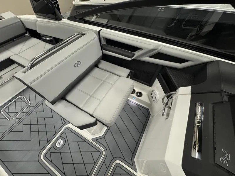 Slide: The Image of 2025 Cobalt R6 boat interior with sleek gray seating and modern design. - 20