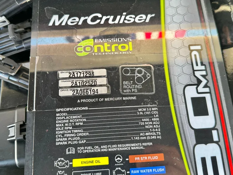 Slide: The Image of MerCruiser engine label on 2013 Bayliner 185 Bowrider, featuring emissions control technology. - 15
