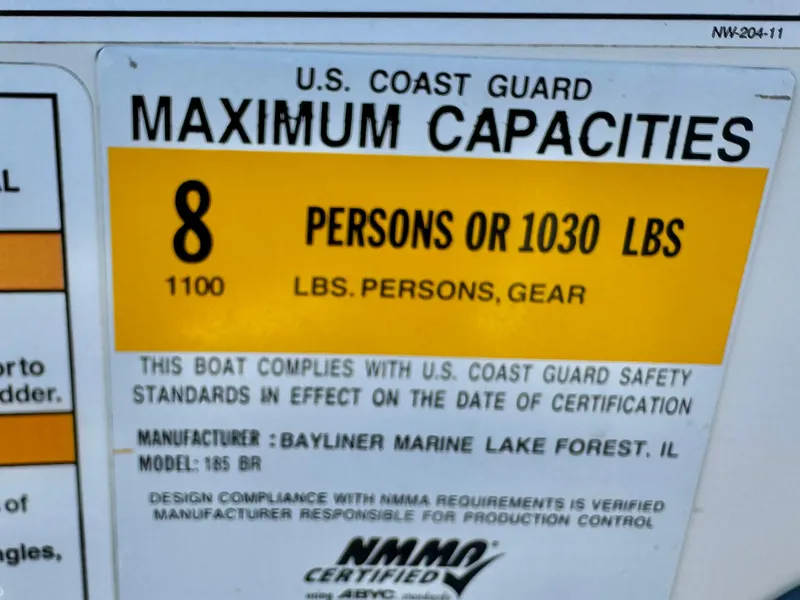 Slide: The Image of 2013 Bayliner 185 Bowrider capacity label, 8 persons or 1030 lbs, U.S. Coast Guard certified. - 23