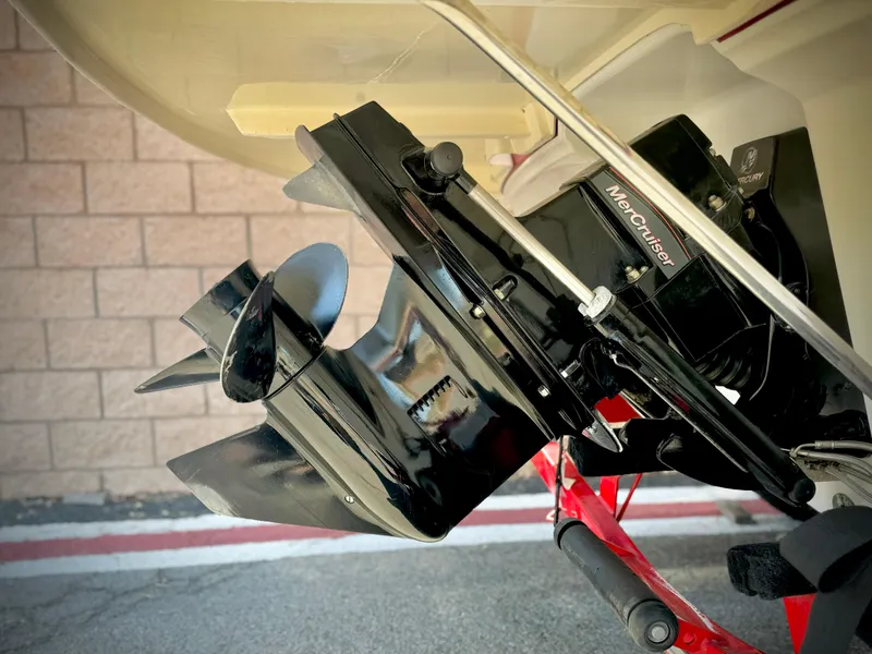 Slide: The Image of 2013 Bayliner 185 Bowrider boat with MerCruiser outdrive, close-up view. - 7