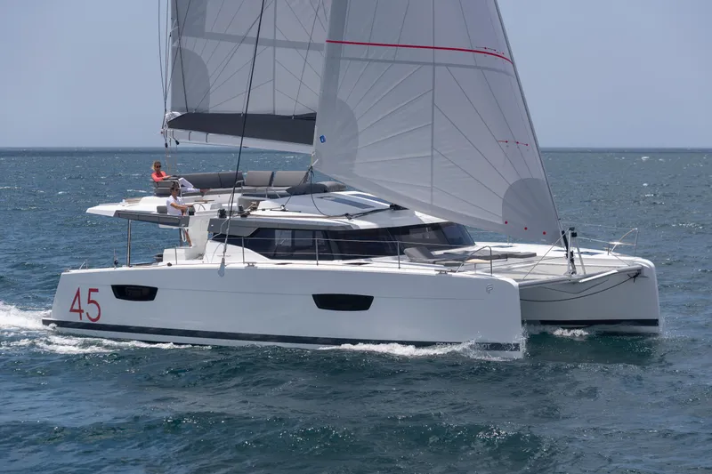 Slide: The Image of 2025 Fountaine Pajot Elba 45 catamaran sailing on open sea. - 3