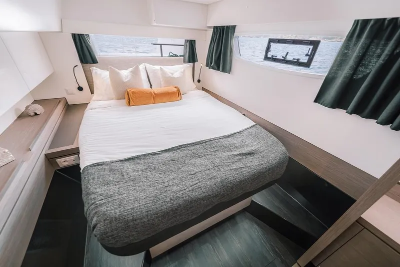 Slide: The Image of Luxurious bedroom interior of 2025 Fountaine Pajot Tanna 47 yacht with modern design. - 9