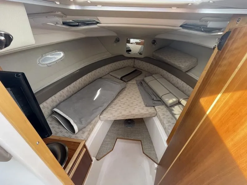 Slide: The Image of 2022 Cutwater C-248 cabin interior with cozy seating and modern design. - 5