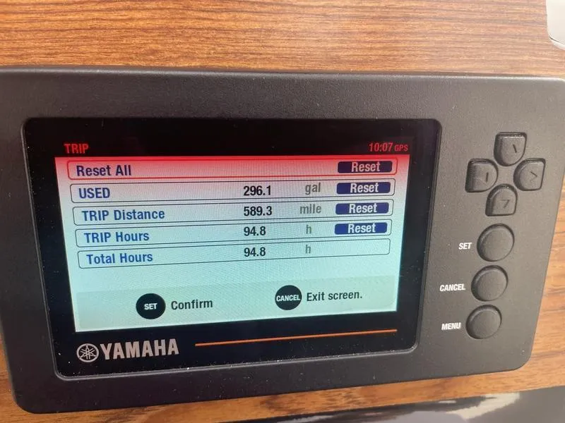 Slide: The Image of Yamaha display showing trip data: 296.1 gallons used, 589.3 miles, 94.8 hours. - 6