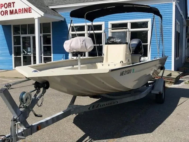 Slide: The Image of 2017 Alumacraft 2072 Bay boat on trailer outside marine store. - 8