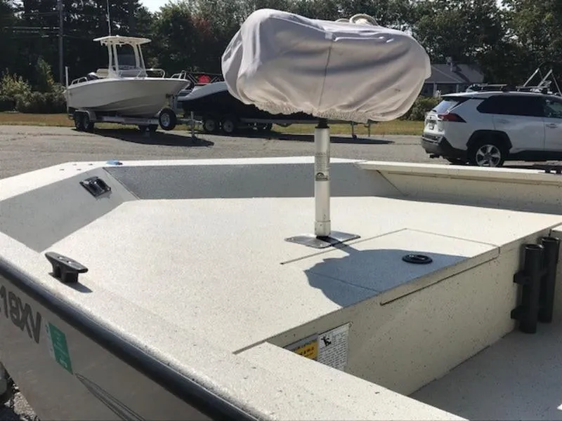 Slide: The Image of 2017 Alumacraft 2072 Bay boat with covered seat, parked outdoors. - 9