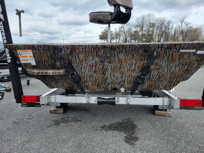 Slide: The Image of 2025 Xpress HD16DB duck hunting boat with Yamaha 25 hp engine, camo design. - 10
