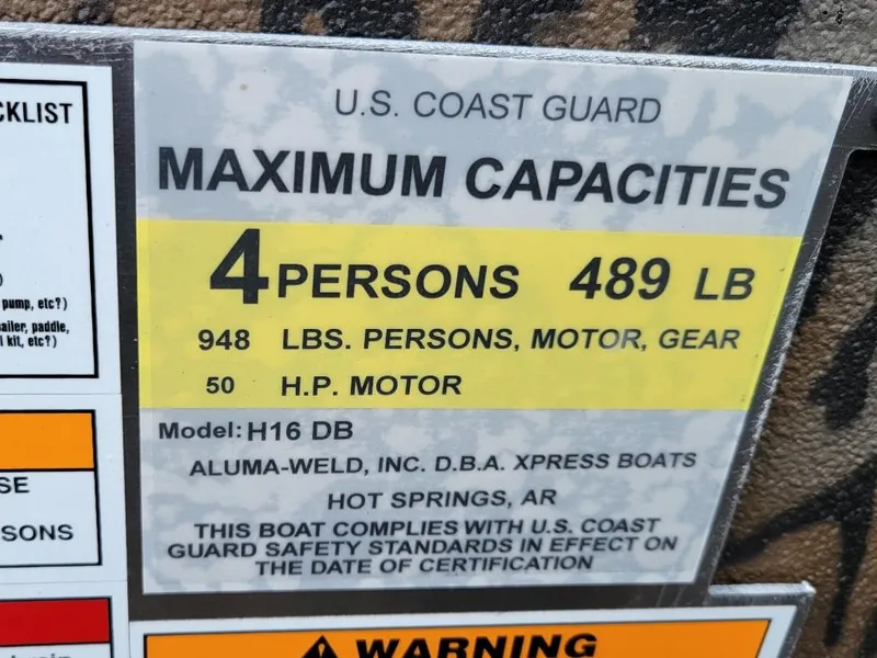 Slide: The Image of 2025 Xpress HD16DB duck hunting boat capacity label, 4 persons, 489 lbs, 50 HP motor. - 13