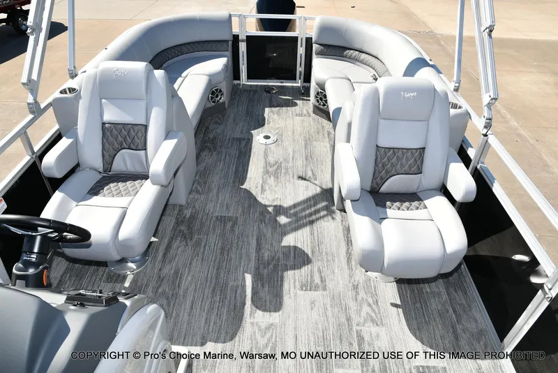 Slide: The Image of 2025 Ranger 243C Cruise boat interior with luxurious seating and modern design. - 10