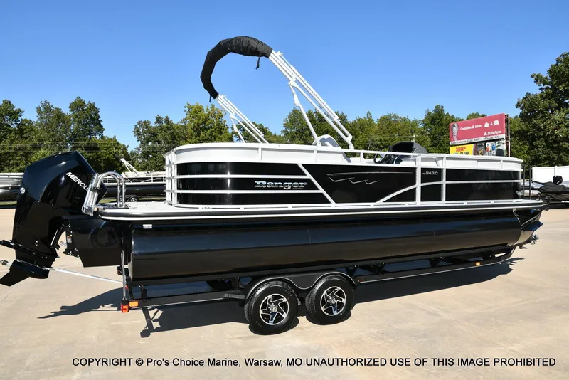 Slide: The Image of 2025 Ranger 243C Cruise pontoon boat with 250HP Mercury 4 Stroke engine on trailer. - 13