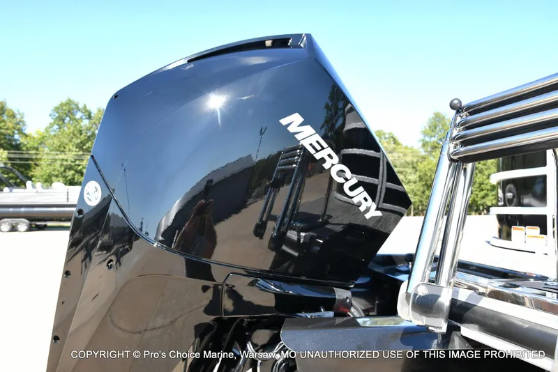 Slide: The Image of 2025 Ranger 243C Cruise with 250HP Mercury 4 Stroke engine, close-up view. - 14