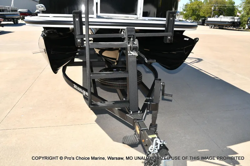 Slide: The Image of 2025 Ranger 243C Cruise boat trailer hitch close-up in a sunny marina. - 20