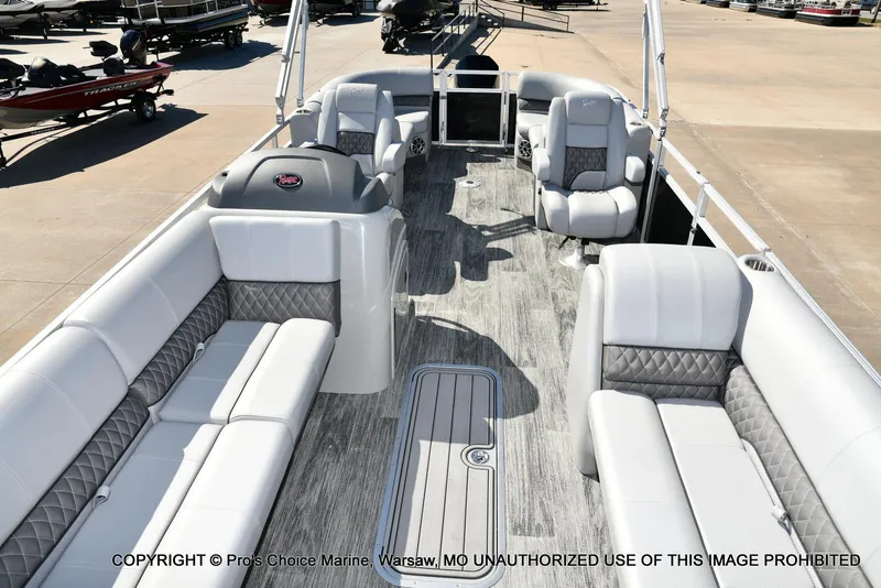 Slide: The Image of 2025 Ranger 243C Cruise boat interior with luxurious seating and modern design. - 21