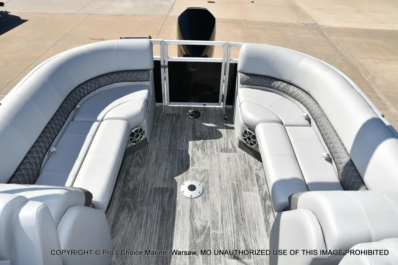 Slide: The Image of 2025 Ranger 243C Cruise boat interior with luxurious seating and modern design. - 34