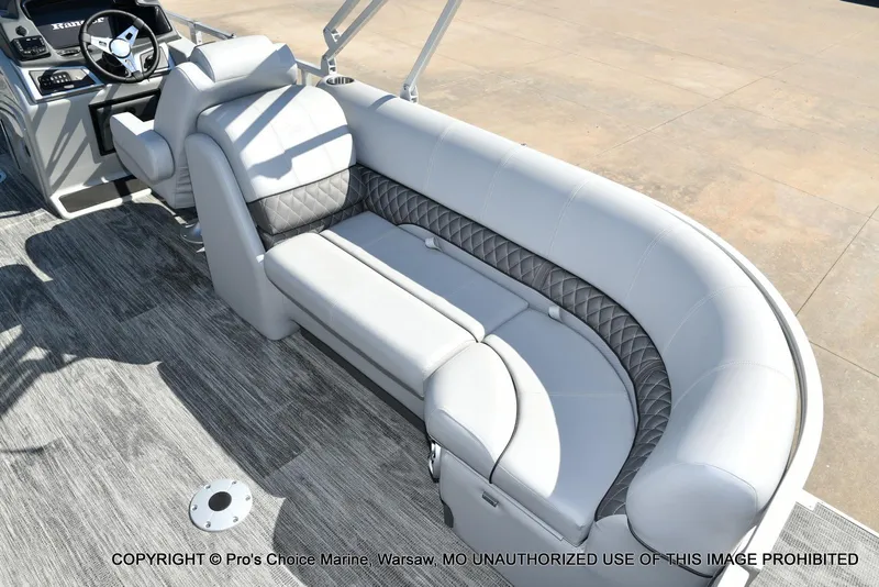 Slide: The Image of 2025 Ranger 243C Cruise boat interior with luxurious seating and modern design. - 42
