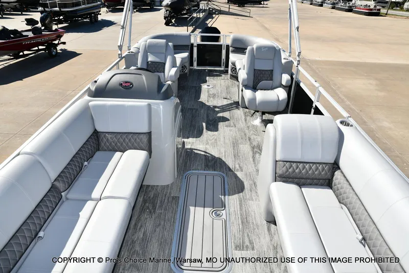 Slide: The Image of 2025 Ranger 243C Cruise boat interior with luxurious seating and modern design. - 5