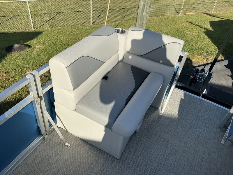 Slide: The Image of 2025 Tahoe Pontoon Boats Sport 17 REAR FISH seating area with gray upholstery. - 11