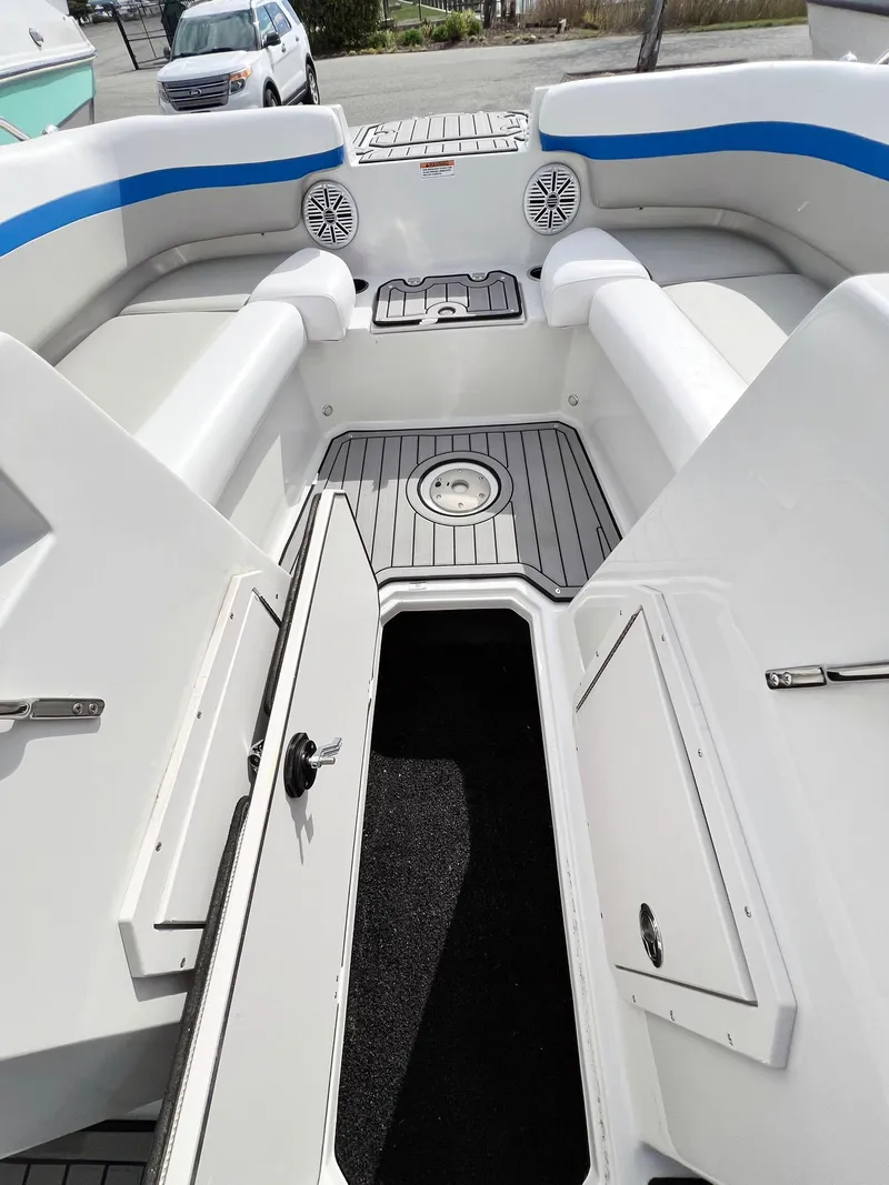 Slide: The Image of 2023 Starcraft SVX 190 OB boat interior with seating and storage compartments. - 8