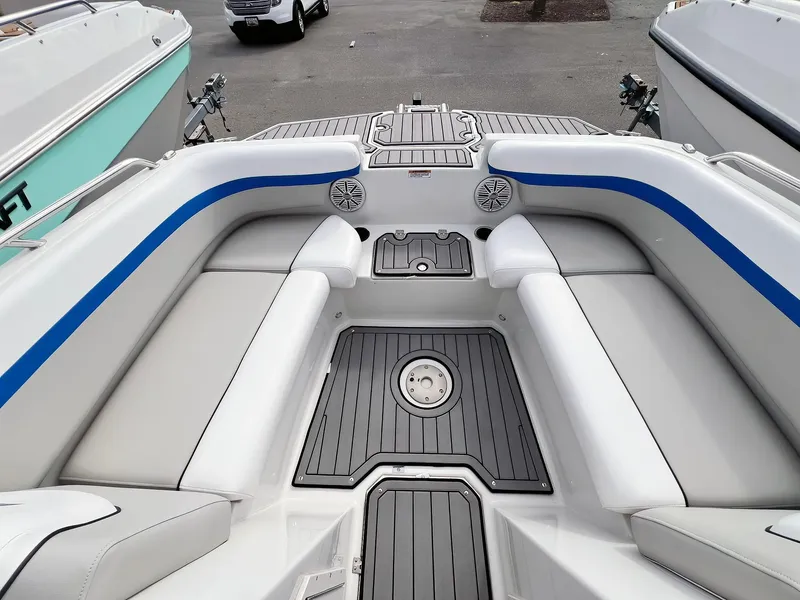 Slide: The Image of 2023 Starcraft SVX 190 OB boat interior with cushioned seating and sleek design. - 9