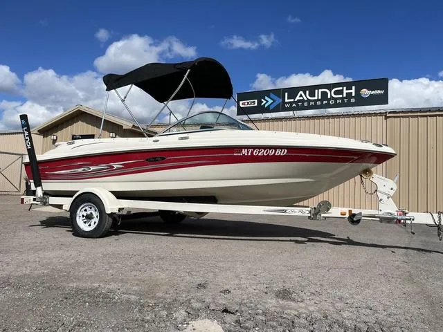 Slide: The Image of 2005 Sea Ray 180 Sport boat on trailer at Launch Watersports dealership. - 3