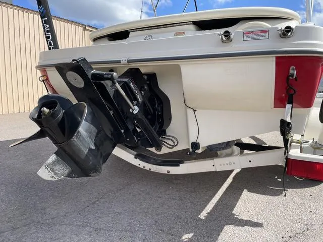 Slide: The Image of 2005 Sea Ray 180 Sport boat stern with outboard motor and trailer. - 4