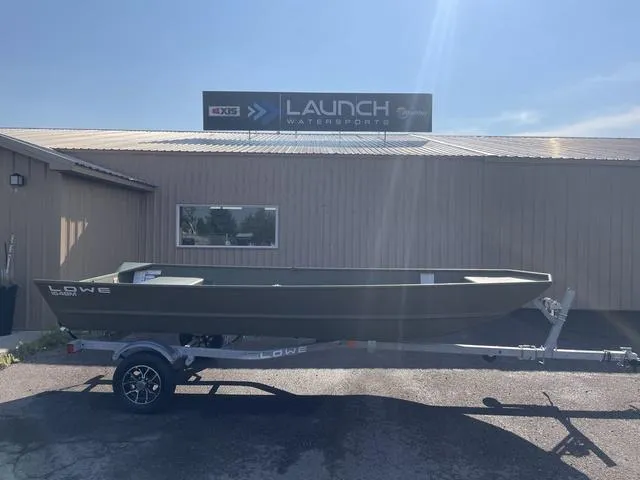 Slide: The Image of 2025 Lowe 1648M boat on trailer outside Launch Watersports building. - 1