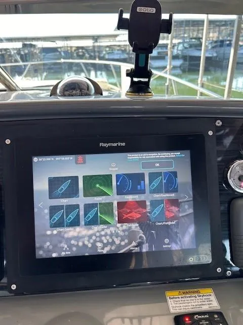 Slide: The Image of Raymarine navigation display on 2015 Formula 34 PC boat dashboard. - 17