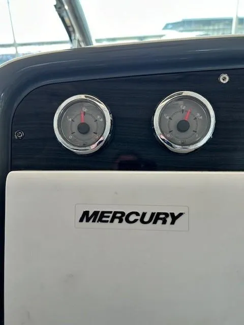 Slide: The Image of Dashboard of a 2015 Formula 34 PC boat with Mercury gauges. - 18