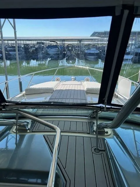 Slide: The Image of 2015 Formula 34 PC yacht docked in marina, viewed from cockpit. - 23