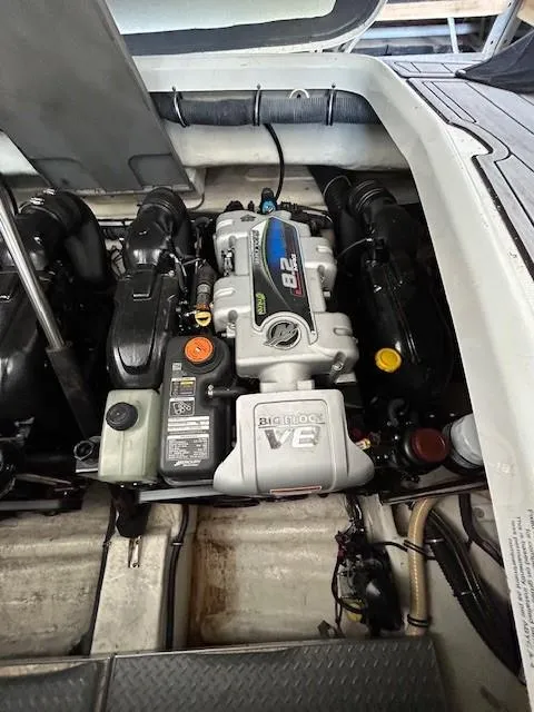 Slide: The Image of Engine compartment of a 2015 Formula 34 PC boat, featuring a Big Block V8 engine. - 25