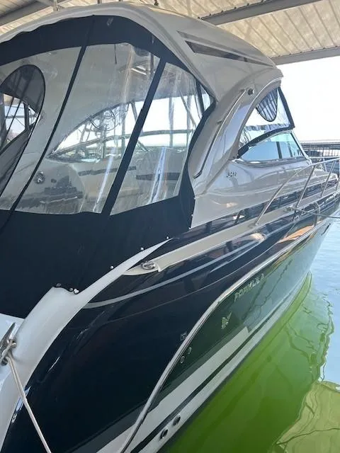 Slide: The Image of 2015 Formula 34 PC yacht docked in a covered marina. - 3