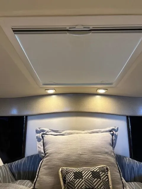 Slide: The Image of Interior cabin of 2015 Formula 34 PC yacht with skylight and cushions. - 30