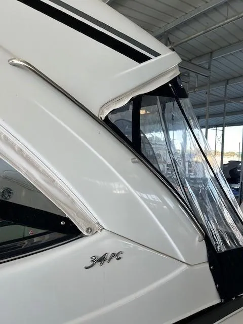 Slide: The Image of 2015 Formula 34 PC boat detail under covered dock. - 33