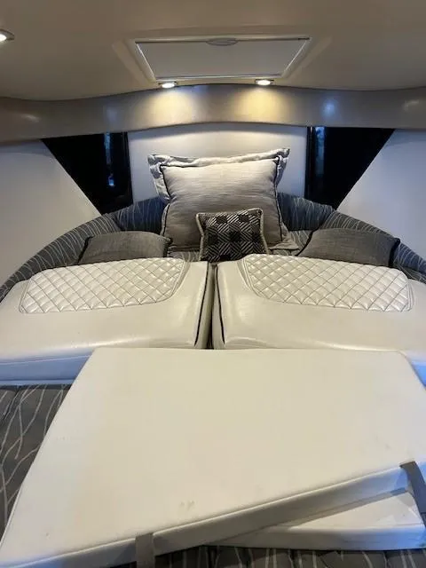Slide: The Image of Luxurious interior of 2015 Formula 34 PC boat with plush seating and cushions. - 36