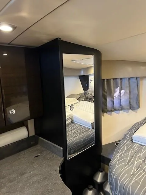Slide: The Image of Interior of 2015 Formula 34 PC yacht with mirror and modern furnishings. - 37