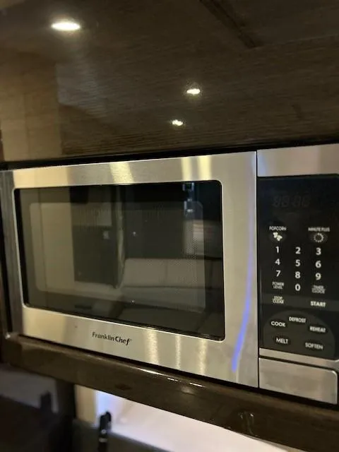 Slide: The Image of Stainless steel Franklin Chef microwave in a 2015 Formula 34 PC yacht kitchen. - 42