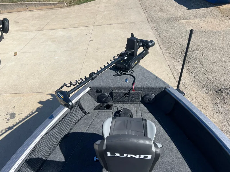 Slide: The Image of 2025 Lund 2075 IMPACT XS boat interior with trolling motor and seating. - 9