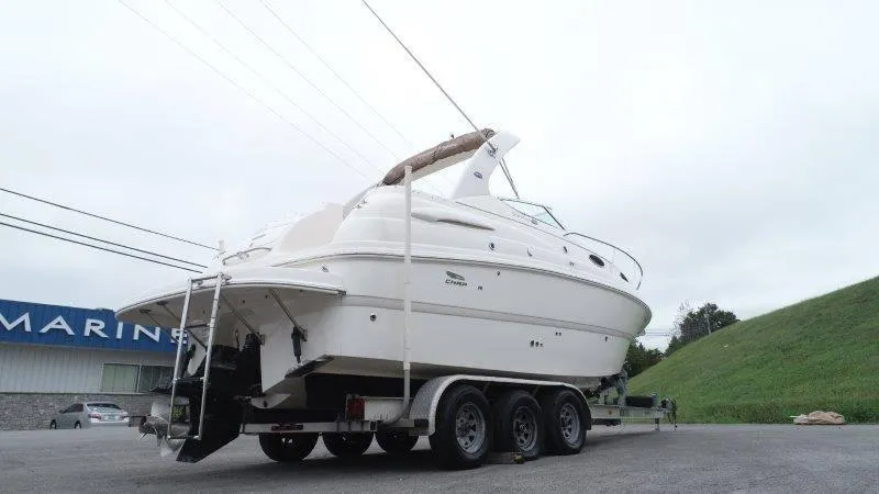 Slide: The Image of 2004 Chaparral 260 Signature boat on trailer at marina. - 5