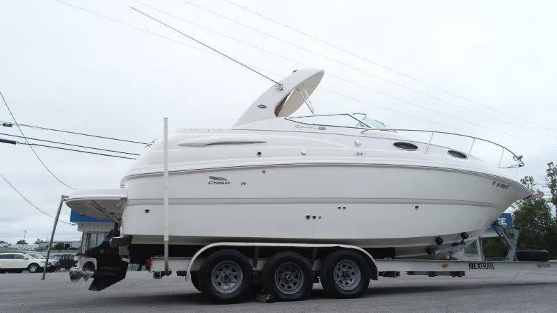 Slide: The Image of 2004 Chaparral 260 Signature boat on trailer, side view. - 8