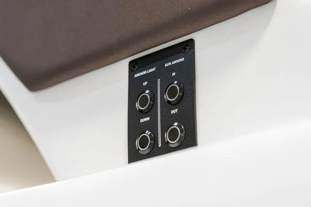 Slide: The Image of Control panel in 2025 Cobalt R33, featuring anchor light and sun awning buttons. - 15