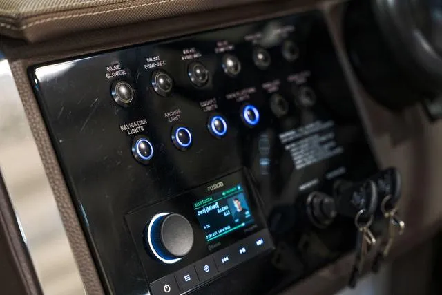 Slide: The Image of Control panel of 2025 Cobalt R33 with illuminated buttons and digital display. - 22